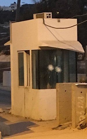 The guard booth that was hit in a shooting attack north of Ramallah by a Palestinian police officer on October 31, 2016. (Twitter)