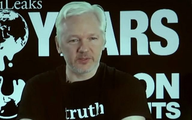 WikiLeaks founder Julian Assange addresses a press conference held by the organization in Berlin on October 4, 2016. Assange is holed up in the Ecuadorean embassy in London, to evade an extradition request by Sweden over rape allegations. (screen capture: YouTube)