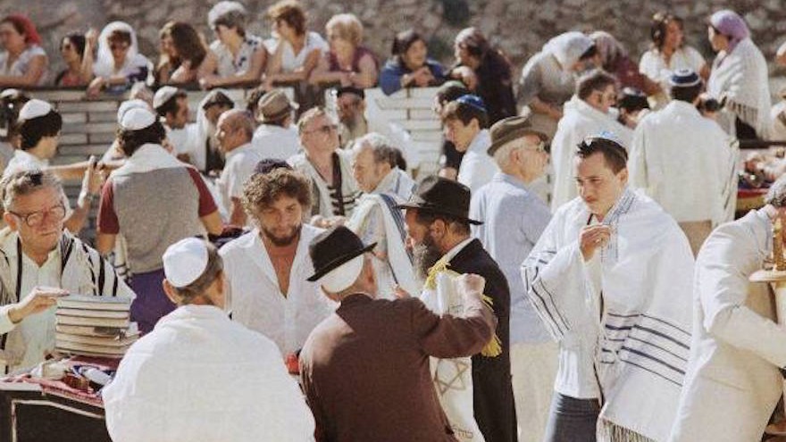 Bob Dylan, third from left, with his son Jesse, in the white tallis on right, at the Western Wall in September 1983. (Facebook)