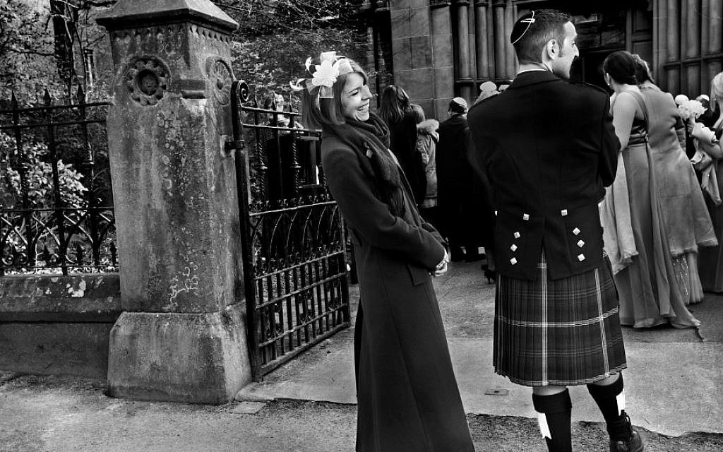 Photographer Judah Passow said that in this picture of a guest wearing a tartan kilt at a Jewish wedding, there was also a bagpiper present. But Passow decided it was too cliche to include him. (Judah Passow)