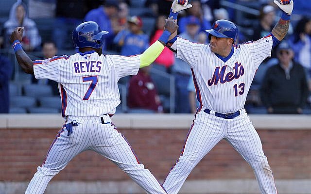 Jose Reyes, left, celebrating with Mets teammate Asdrubal Cabrera during a game against the Philadelphia Phillies at Citi Field in New York, Sept. 25, 2016. (Adam Hunger/Getty Images via JTA)