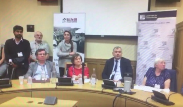 British peer Jenny Tonge (center) and other panelists listen during an anti-Israel meeting at the House of Lords on October 25, 2016 as an audience member blames Jews for antagonzing Hitler into carrying out the Holocaust (screen capture: Facebook)