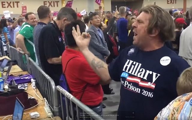 A Trump supporter chants 'Jew S.A.' at a rally for the Republican nominee in Phoenix, Arizona on October 29, 2016 (screen capture: YouTube)