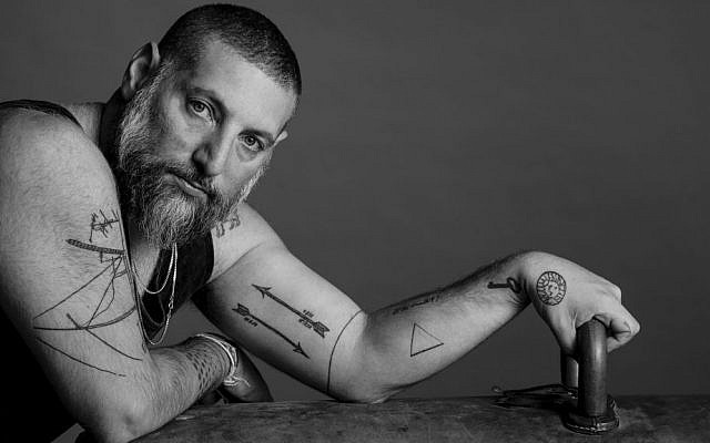 Chef Asaf Granit shows off his biceps and tatts for 'LOOK AT ME' (Courtesy Ron Kedmi)