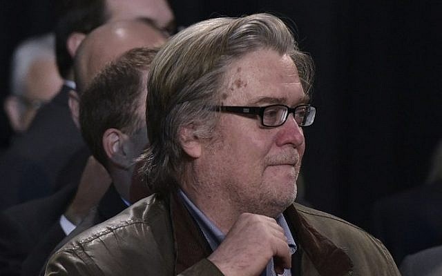 Stephen Bannon watches as Republican presidential nominee Donald Trump addresses the final rally of his 2016 presidential campaign at Devos Place in Grand Rapids, Michigan on November 7, 2016. (AFP/Mandel Ngan)