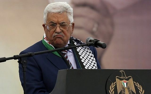 Palestinian Authority President Mahmoud Abbas speaking at a rally marking the 12th anniversary of the death of Yasser Arafat in Ramallah, November 10, 2016. (AFP/Abbas Momani)