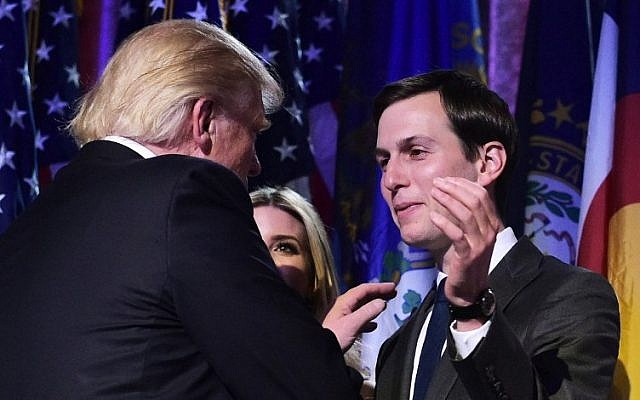Donald Trump shakes hands with son-in-law Jared Kushner during an election night party at a hotel in New York on November 9, 2016. (AFP / MANDEL NGAN)