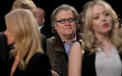 Republican presidential nominee Donald Trump's campaign CEO Steve Bannon listens to Trump speak during his final campaign rally on Election Day in the Devos Place November 8, 2016 in Grand Rapids, Michigan. (Chip Somodevilla/Getty Images/AFP)