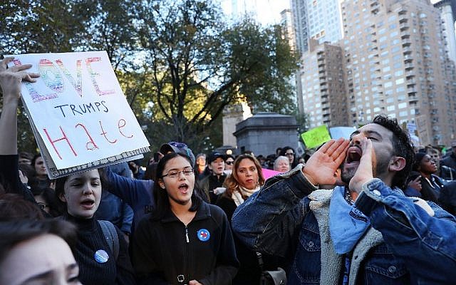 Thousands of anti-Donald Trump protesters, including many pro-immigrant groups, hold a demonstration outside of a Trump property as New Yorkers react to Trump's election as president of the United States on November 13, 2016 in New York City. (Spencer Platt/Getty Images/AFP)