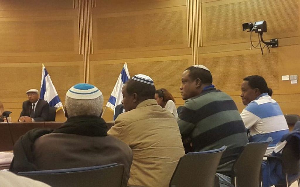 Ethiopian Israelis appeal to government to allow their relatives to immigrate in the Knesset on November 29, 2016. Yahallem Tadessa is pictured on the second right (Marissa Newman/Times of Israel)