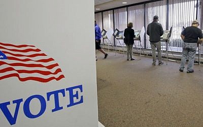 People vote during early voting for the 2016 General Election at the Salt Lake County Government Center on Tuesday, Nov. 1, 2016, in Salt Lake City. (AP/Rick Bowmer)