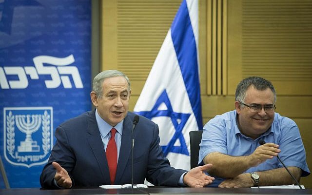 Prime Minister Benjamin Netanyahu (left) and MK David Bitan attend a Likud faction meeting in the Knesset, October 31, 2016. (Miriam Alster/FLASH90)
