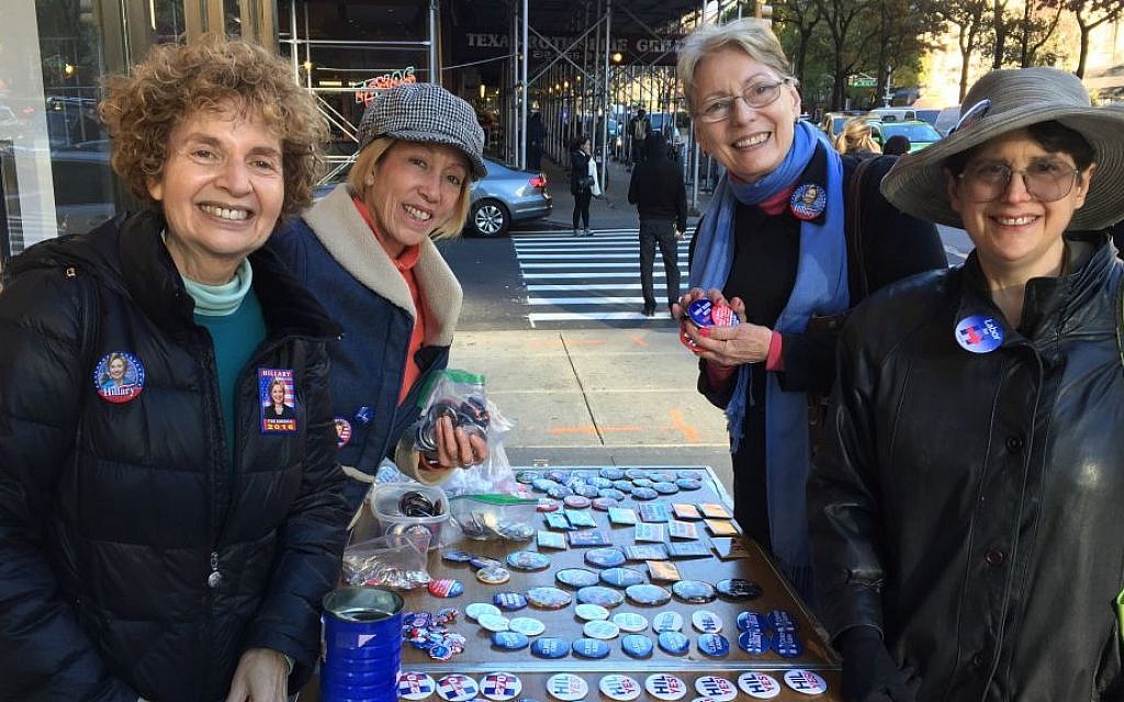 Karen Terban (left) and her fellow Hillary activists hawking Hillary pins on an Upper West Side sidewalk on Monday afternoon, November 7, 2016 (Jessica Steinberg/Times of Israel)