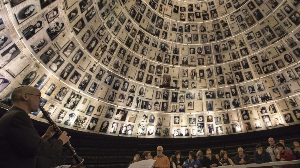 Israeli musicians perform at Yad Vashem Holocaust Memorial in Jerusalem in a somber tribute to the works of musicians who created a vibrant cultural life in the Terezin concentration camp before being sent to their deaths. Monday, Nov. 21, 2016 (AP Photo/Tsafrir Abayov)