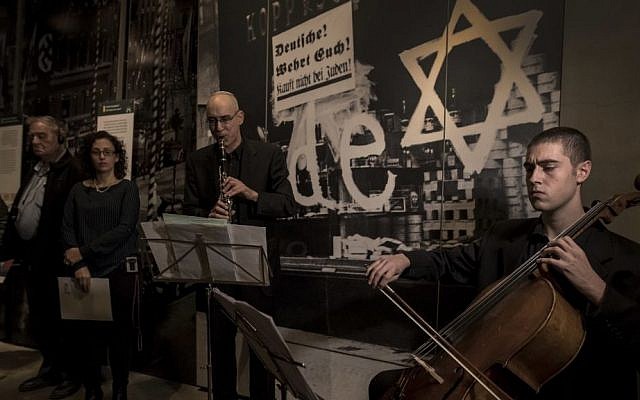 Israeli musicians perform at the Yad Vashem Holocaust Memorial in Jerusalem in a somber tribute to the works of musicians who created a vibrant cultural life in the Terezin concentration camp before being sent to their deaths. Monday, Nov. 21, 2016 (AP Photo/Tsafrir Abayov)