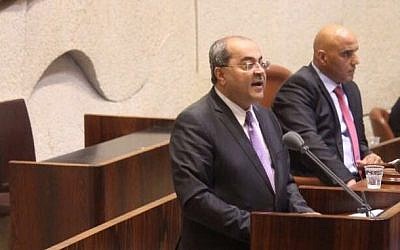 Joint List MK Ahmad Tibi sings the Muslim call to prayer on the podium of the Knesset on November 14, 2016, to protest proposed legislation that would silence the call to prayer in early mornings (Joint List)