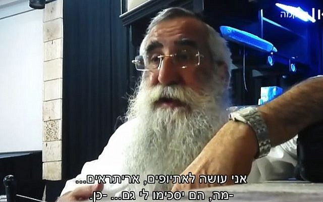 Rabbi Eliyahu Asulin, a certified mohel, telling an undercover reporter that he should practice on babies from low-income families. (Screen capture: Israeli Public Broadcasting Corporation)