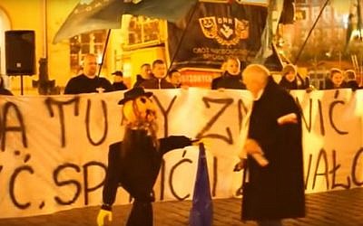 Protesters set fire to an effigy of an Orthodox Jew during an anti-migrant protest in the Polish town of Wroclaw in November 2015 (screen capture: YouTube)