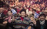 Russian immigrants attend an event marking the 25th anniversary of the major wave of aliya from the former Soviet Union to Israel, at the Jerusalem Convention Center, on December 24, 2015. (Hadas Parush/Flash90)