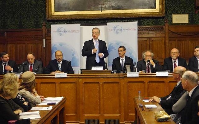 MP Michael Gove speaks, and former Israeli Foreign Ministry director general Dore Gold, Israeli Ambassador to the UK Mark Regev, and other speakers  look on, at a Houses of Parliament event to mark the 100th anniversary of the Balfour Declaration, November 29, 2016 (Courtesy)