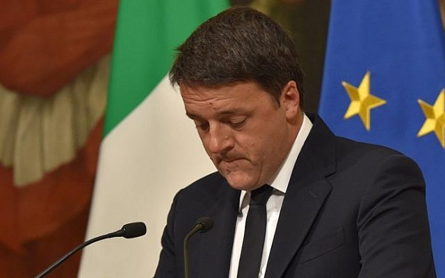 Italian Prime Minister Matteo Renzi announces his resignation during a news conference at the Palazzo Chigi following the results of the vote for a referendum on constitutional reforms, on December 5, 2016 in Rome.  (Andreas Solaro/AFP via Getty Images) 