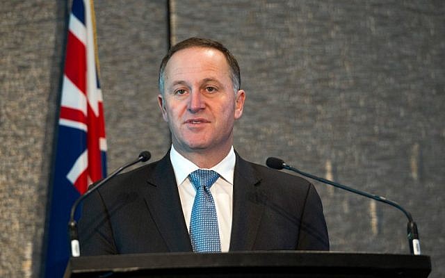 New Zealand Prime Minister John Key speaking at a press conference in Auckland, September 2, 2014. (AFP/DAVID ROWLAND)