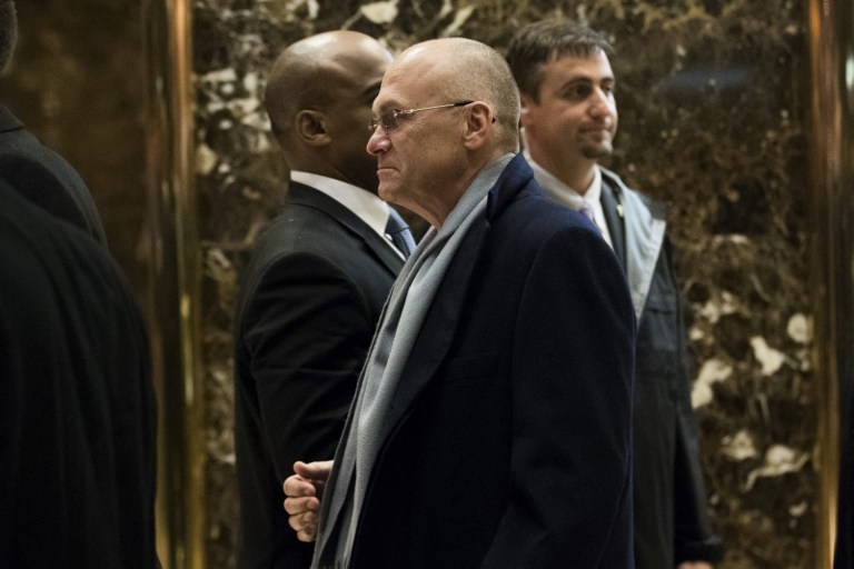 CEO of CKE Restaurants Andy Puzder (C) departs Trump Tower, December 7, 2016 in New York City. President-elect Donald Trump and his transition team are in the process of filling cabinet and other high level positions for the new administration. (Drew Angerer/Getty Images/AFP)