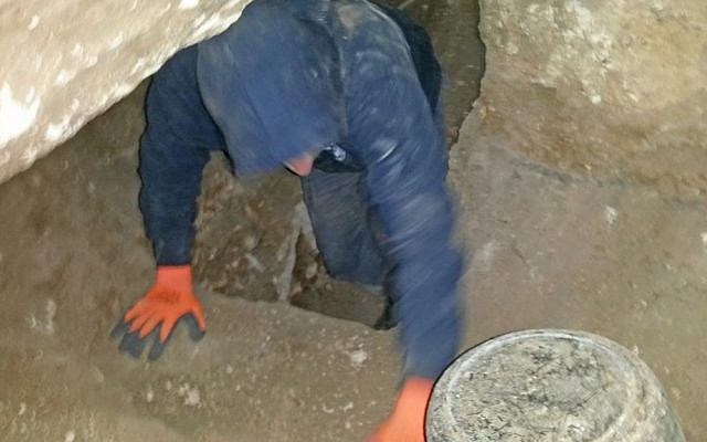 Antiquities thieves exiting the burial cave in northern Israel when caught by IAA inspectors in December 2016. (Nis Distelfeld, Israel Antiquities Authority)