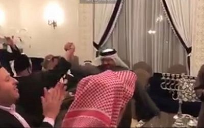 Jews and sheikhs celebrate Hanukkah in Bahrain, December 24, 2016 (Screen capture: YouTube)