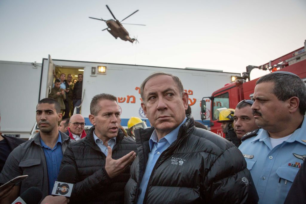 Prime Minister Benjamin Netanyahu visits scene of forest fires that broke out in Zichron Yaakov in northern Israel, on November 23, 2016. (Emil Salman/Pool)