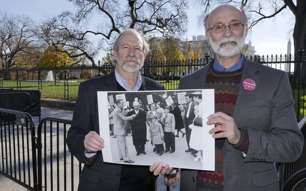 Michael Meeropol and brother Robert Meeropol outside the White House at a December 1, 2016, Washington, DC, rally aimed at clearing their mother's name. (Alan Heath/Rosenberg Fund for Children)