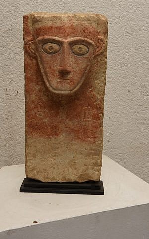 In this picture released and publicly provided by the Geneva prosecutor a piece of confiscated artifacts is on display in Geneva Switzerland Friday Dec. 2, 2016. Swiss authorities have confiscated artifacts the Geneva prosecutor’s office says were stolen from Yemen, Libya and the ancient city of Palmyra in Syria. ( Geneva Prosecutors Office via AP)