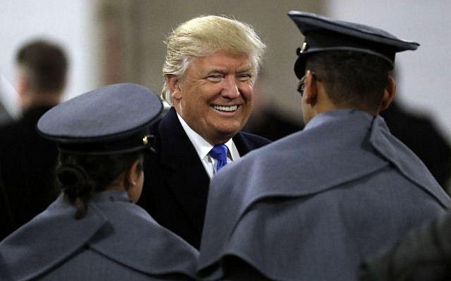President-elect Donald Trump, center, greets Army Cadets before the Army-Navy NCAA college football game in Baltimore, Saturday, Dec. 10, 2016. (AP Photo/Patrick Semansky)