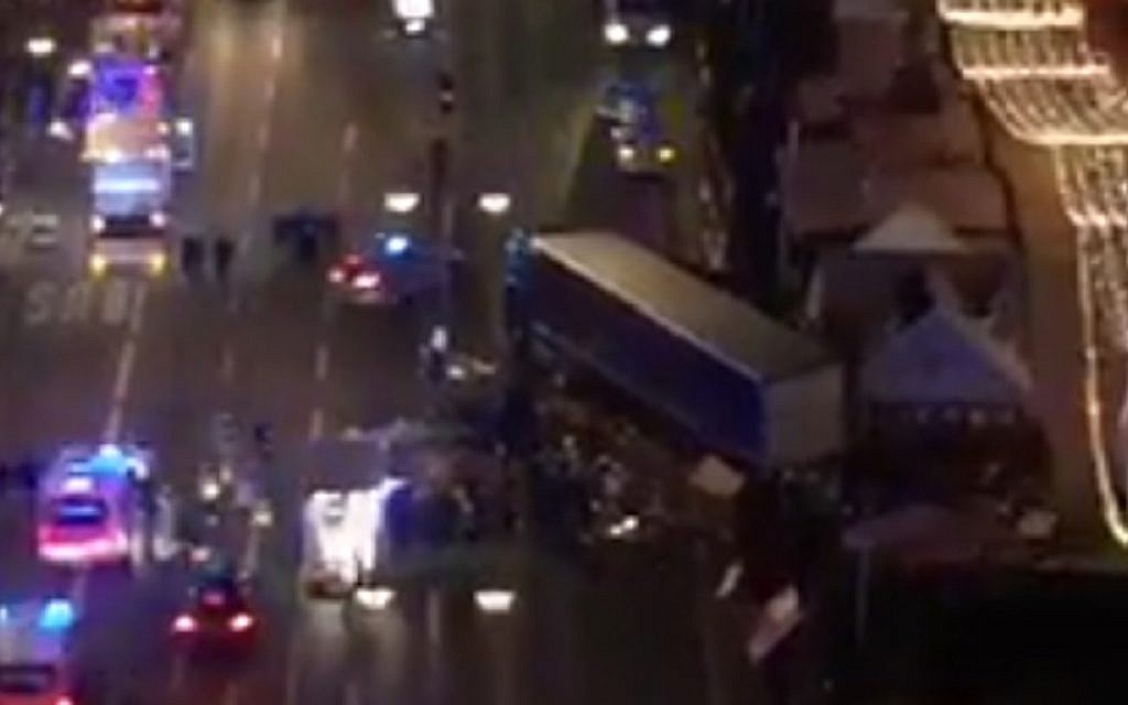 The scene of a possible attack after a truck crashed into a Berlin Christmas market on December 19, 2016. (screen capture: YouTube)