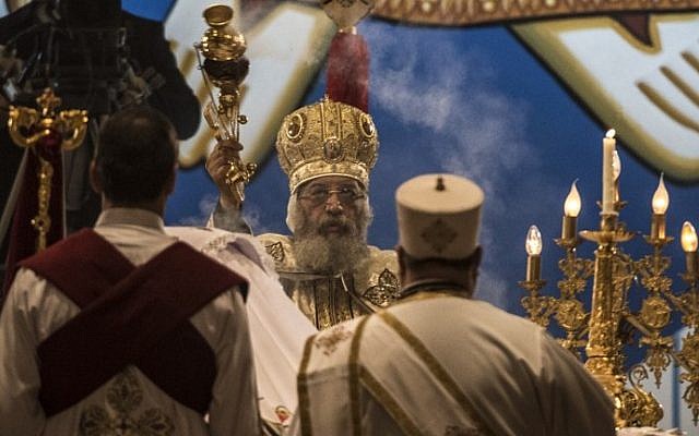 Egyptian Coptic leader Pope Tawadros II leads Christmas celebration at the St. Mark's Coptic Orthodox Cathedral in the Abbassia District of Cairo on January 6, 2017. (AFP/Khaled Desouki)