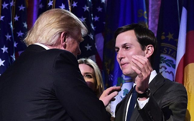 President-elect Donald Trump (L) with son-in-law Jared Kushner during an election night party at a hotel in New York, November 9, 2016. (AFP Photo/Mandel Ngan)