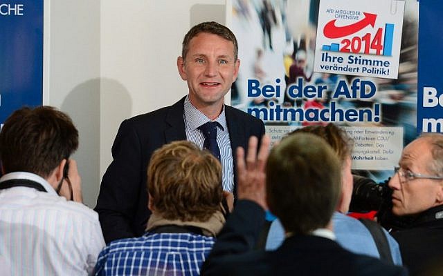 Bjoern Hoecke, center, speaking at a press conference in Berlin, September 15, 2014 . (AFP/JOHN MACDOUGALL)