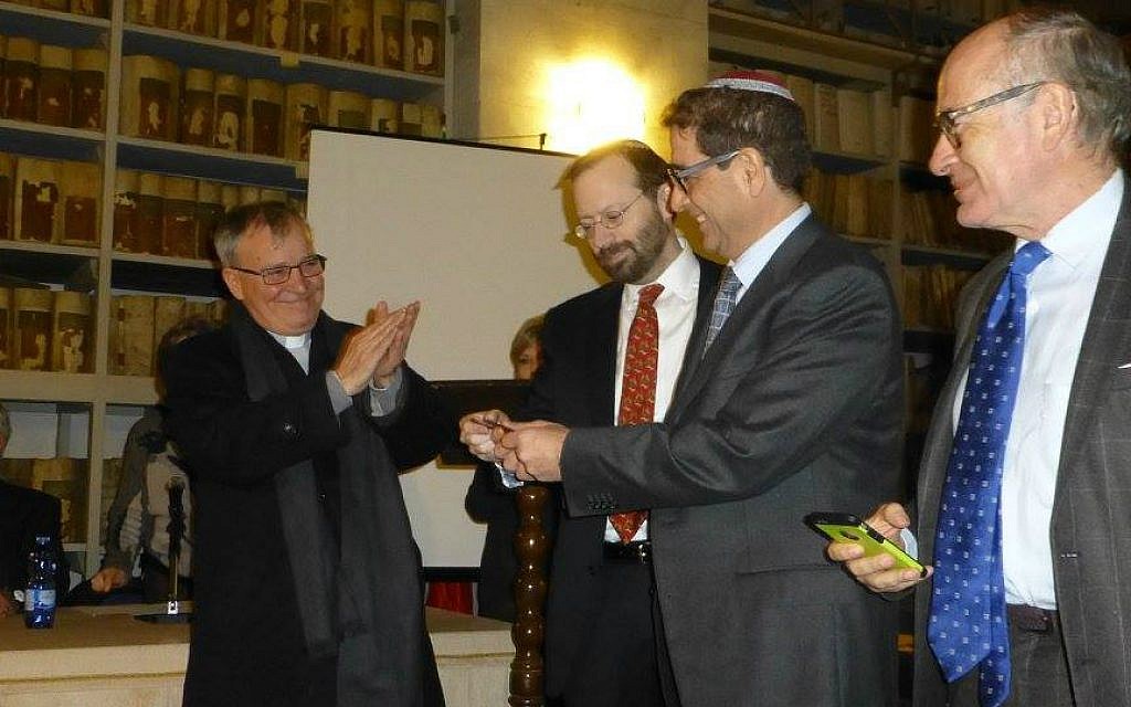 Rabbi Ariel Finzi, second from right, with  Episcopal Vicar Raffaele Mangano (far left), Shavei Israel chairman Michael Freund (left of Finzi), and vice president of the Union of Italian Jewish Communities Giulio Disegni. (Courtesy)