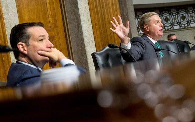 Senate Armed Services Committee members, South Carolina Lindsey Graham (R), right, and Texas Sen. Ted Cruz (R), participate in the committee's hearing on the impacts of the Joint Comprehensive Plan of Action (JCPOA) on Wednesday, July 29, 2015, on Capitol Hill in Washington. (AP Photo/Andrew Harnik) 