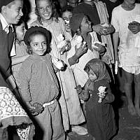 Yemenite Jewish children and their toys in the Hashed camp near Aden, Yemen. 1949. (David Eldan/GPO photo archive)