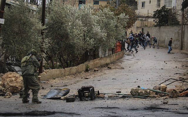 Illustrative. Palestinians clash with Israeli security forces in Jenin on February 6, 2016. (Haytham Shtayeh/FLASH90)
