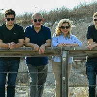 Prime Minister Benjamin Netanyahu, second left, and his wife Sara, second right, tour in Tel Gezer and Magshimim Forest together with their sons Yair, right, and Avner, left, during the Jewish holiday of Sukkot, October 21, 2016. (Kobi Gideon/GPO)