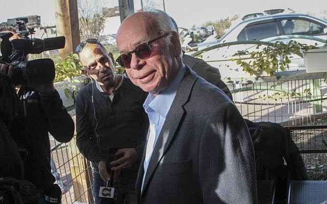 Amos Regev, chief editor of Israel Hayom daily newspaper arrives for questioning in the so called 'Case 2000' affair at the Lahav 433 investigation unit in Lod, January 17, 2017. (Roy Alima/Flash90) 