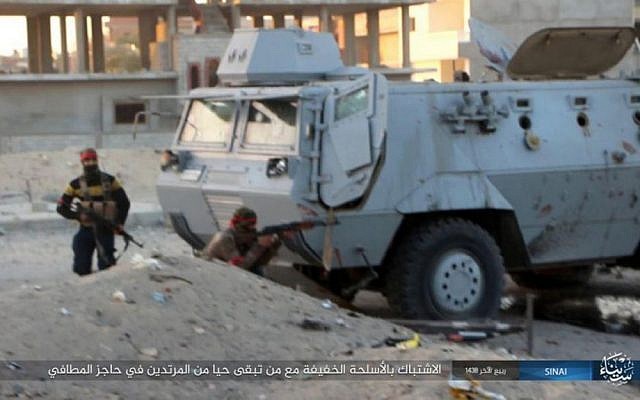 Illustrative: This photo posted on a file sharing website Wednesday, Jan. 11, 2017, by the Islamic State Group in Sinai, shows a deadly attack by terrorists on an Egyptian police checkpoint, Monday, Jan. 9, 2017, in el-Arish, north Sinai, Egypt. (Islamic State Group in Sinai, via AP)