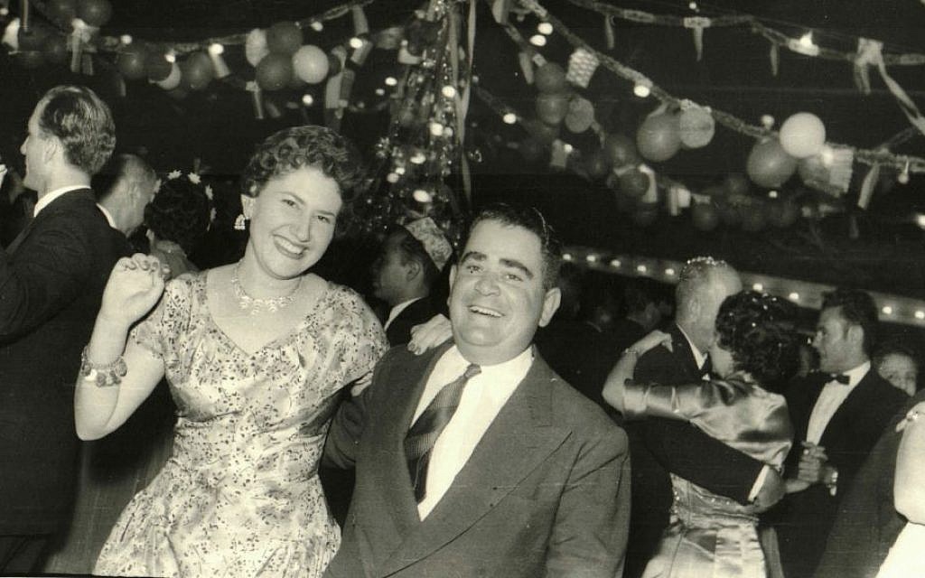 In this 1950’s handout photo, provided by Tales of Jewish Sudan, a New Year’s ball takes place at the Jewish Recreational Club in downtown Khartoum. (Photo courtesy of Flore Eleini, Tales of Jewish Sudan, via AP)