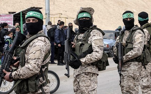 Members of the Hamas terror group's military wing  at a memorial in the southern Gaza Strip town of Rafah on January 31, 2017, for Mohamed Zouari, a 49-year-old Tunisian engineer and drone expert, who was killed at the wheel of his car outside his house in Tunisia in December 2016.  (AFP/Said Khatib)