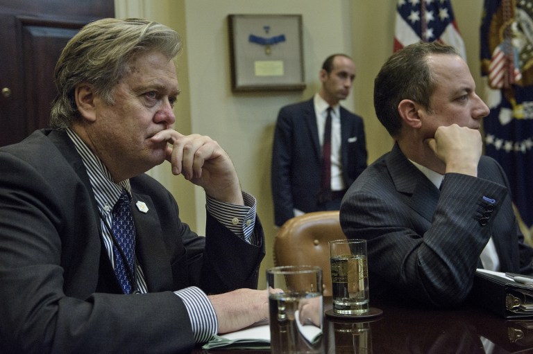 From left: Trump advisor Steve Bannon, advisor Stephen Miller and White House Chief of Staff Reince Priebus listen while US President Donald Trump speaks at the beginning of a meeting with lawmakers in the Roosevelt Room of the White House February 2, 2017 in Washington, DC. (AFP PHOTO / Brendan Smialowski)