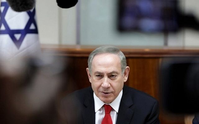 Prime Minister Benjamin Netanyahu chairs the weekly cabinet meeting in Jerusalem on February 5, 2017. (AFP/AP and pool/Dan Balilty)