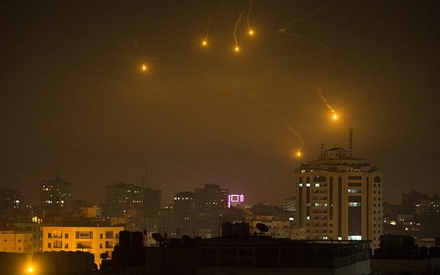 Illustrative: Flares fired by Israeli forces to check the border are seen over Gaza City on February 6, 2017. (Mahmud Hams/AFP)