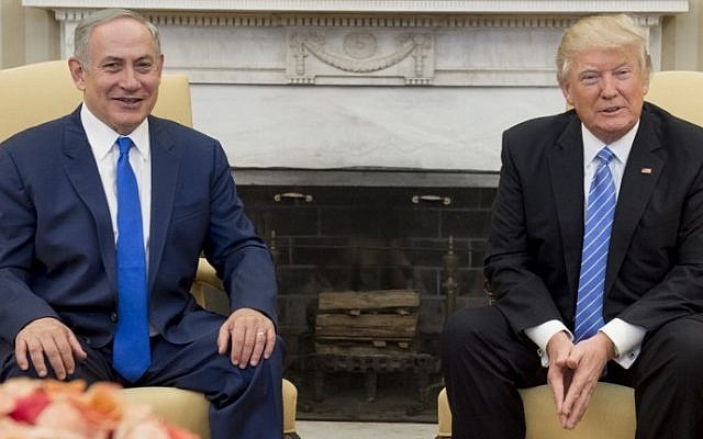 US President Donald Trump and Israeli Prime Minister Benjamin Netanyahu hold a meeting in the Oval Office of the White House in Washington, DC, February 15, 2017. (AFP Photo/Saul Loeb)